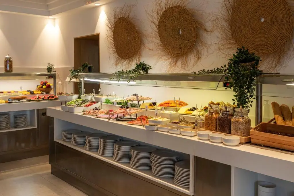 Breakfast buffet arranged in the restaurant at Flacalco Hotels