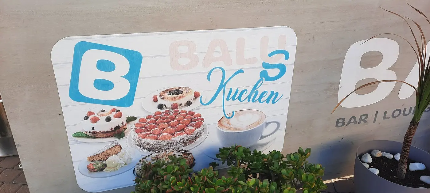 BALUS signs advertising ice cream and cake