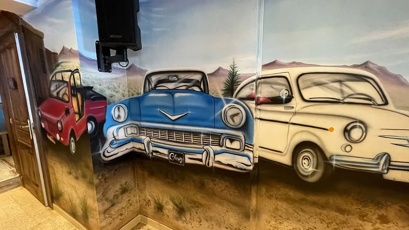 Mural of classic cars at BALUS