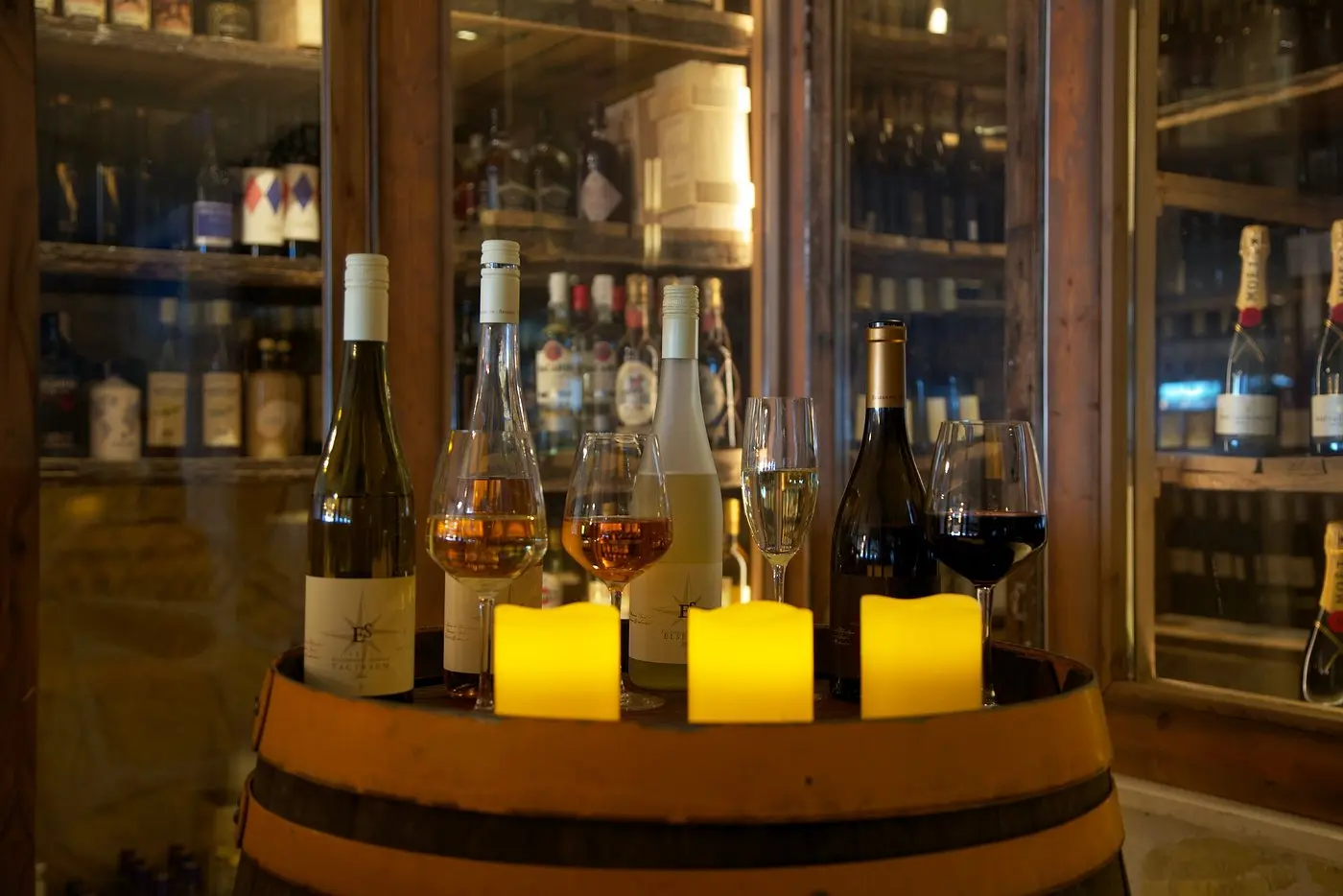 Bottles displayed on a barrel at BALUS