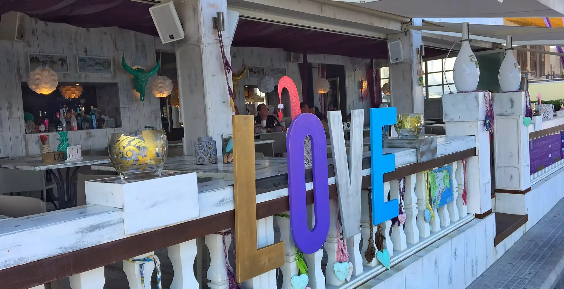 Colourful LOVE letters on the Mama Pizza terrace