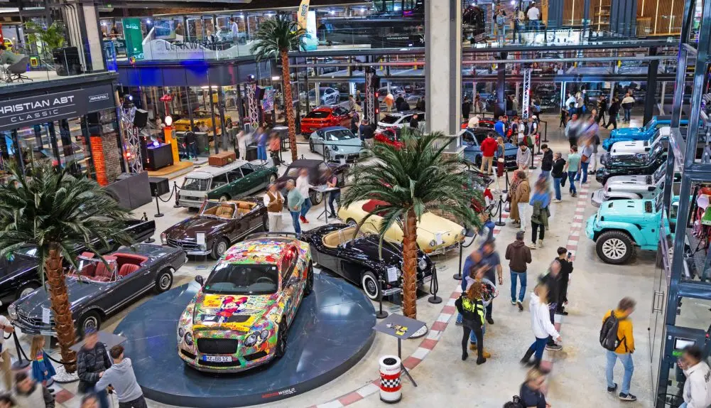 View across classic and customized cars at Motorworld Mallorca