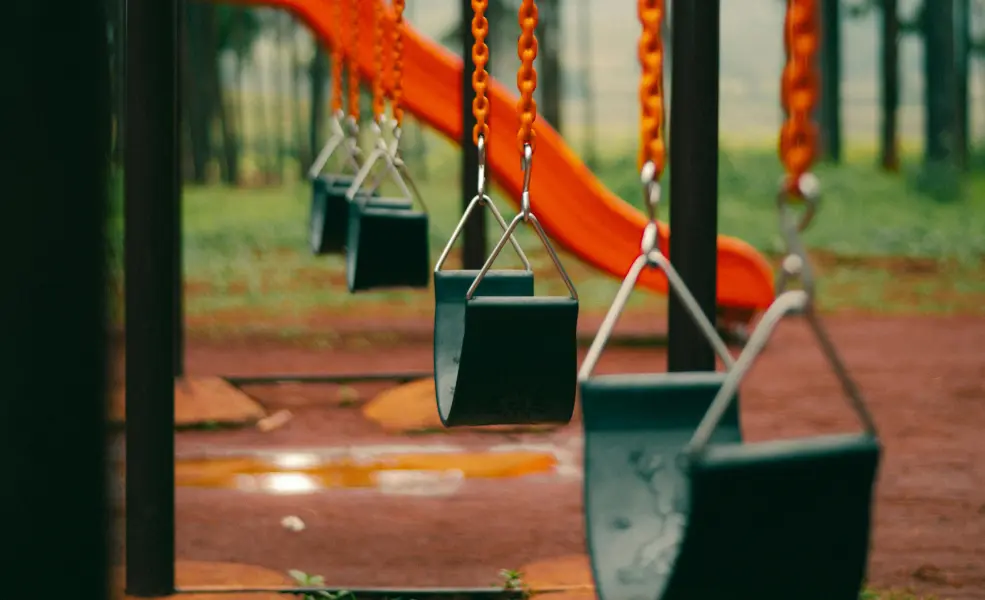 Colorful outdoor children’s play area at Flacalco Hotels