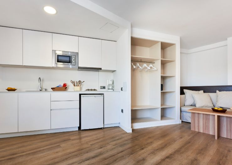 Open Apartment kitchenette beside the sleeping area